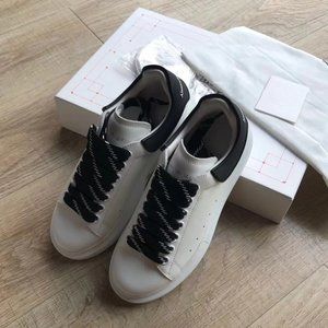 Black tail and black laces men's shoes